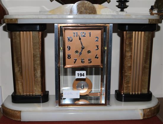 An Art Deco 4 glass clock